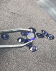 Conjunto de 10 piezas de iolita corte redondo 6.70 quilates